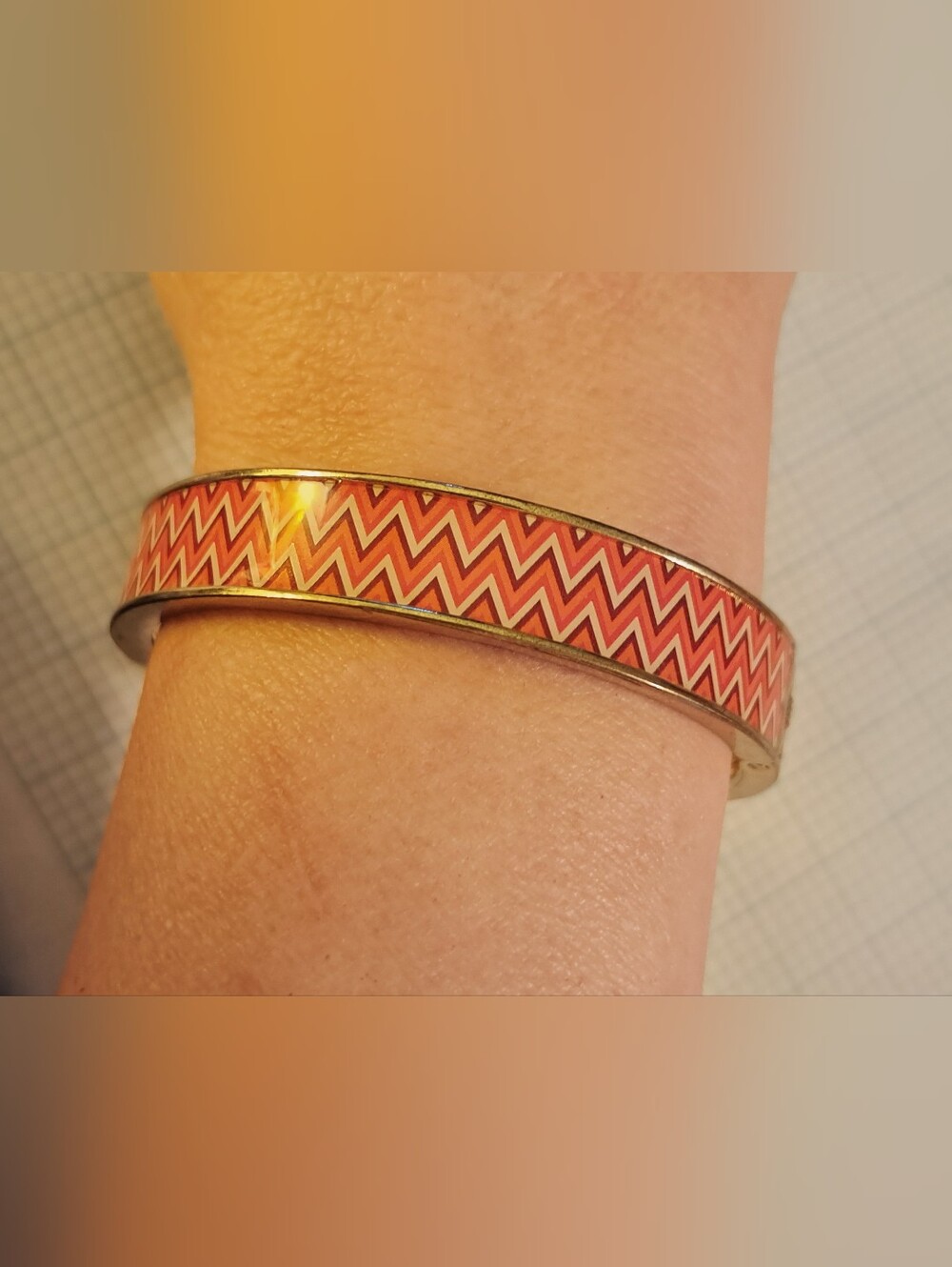 Gold-Tone Chevron Hinged Bangle Bracelet in Coral and White